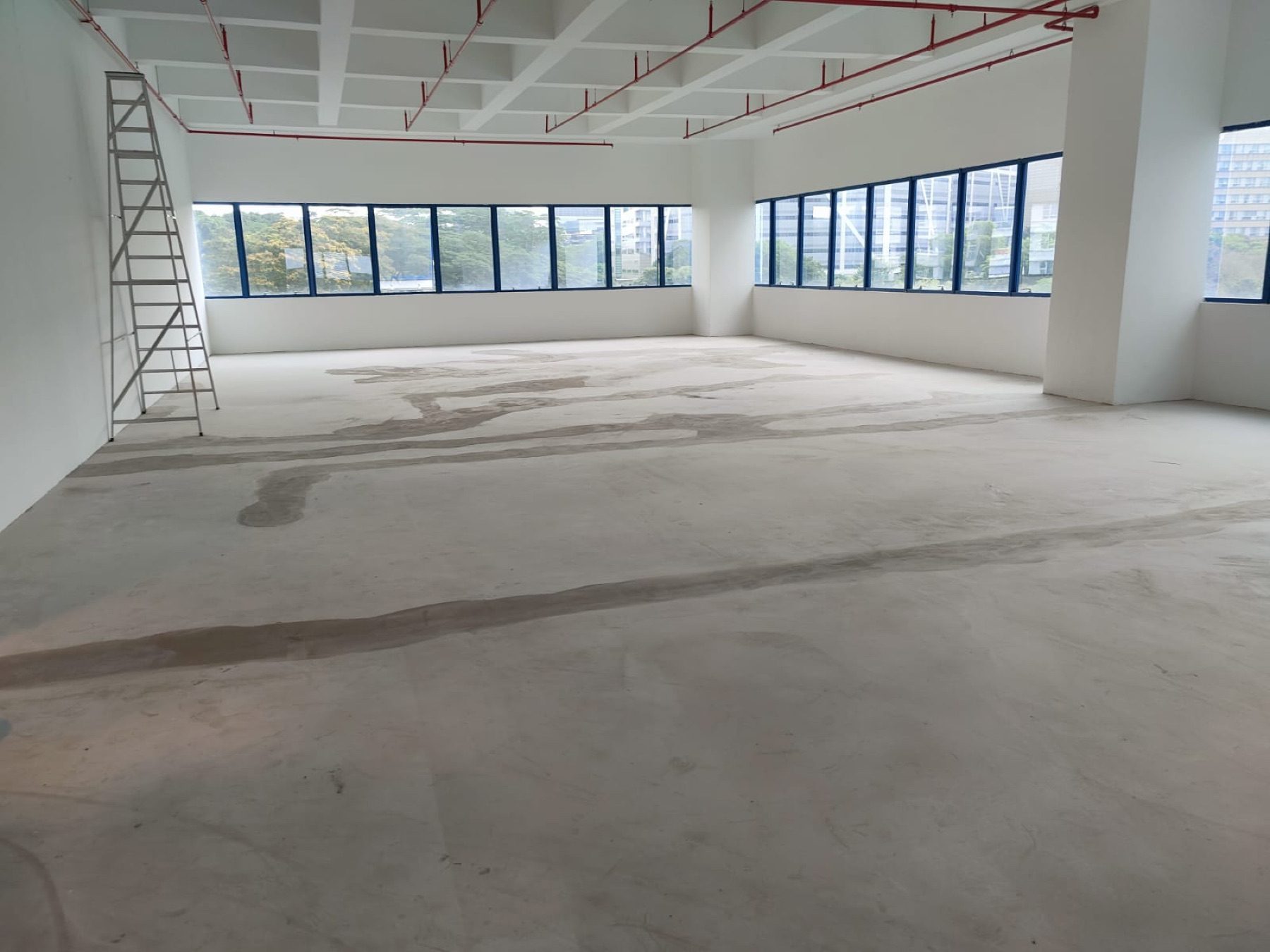 After: unit stripped and handed back bare to the landlord, Haw Par Technocentre