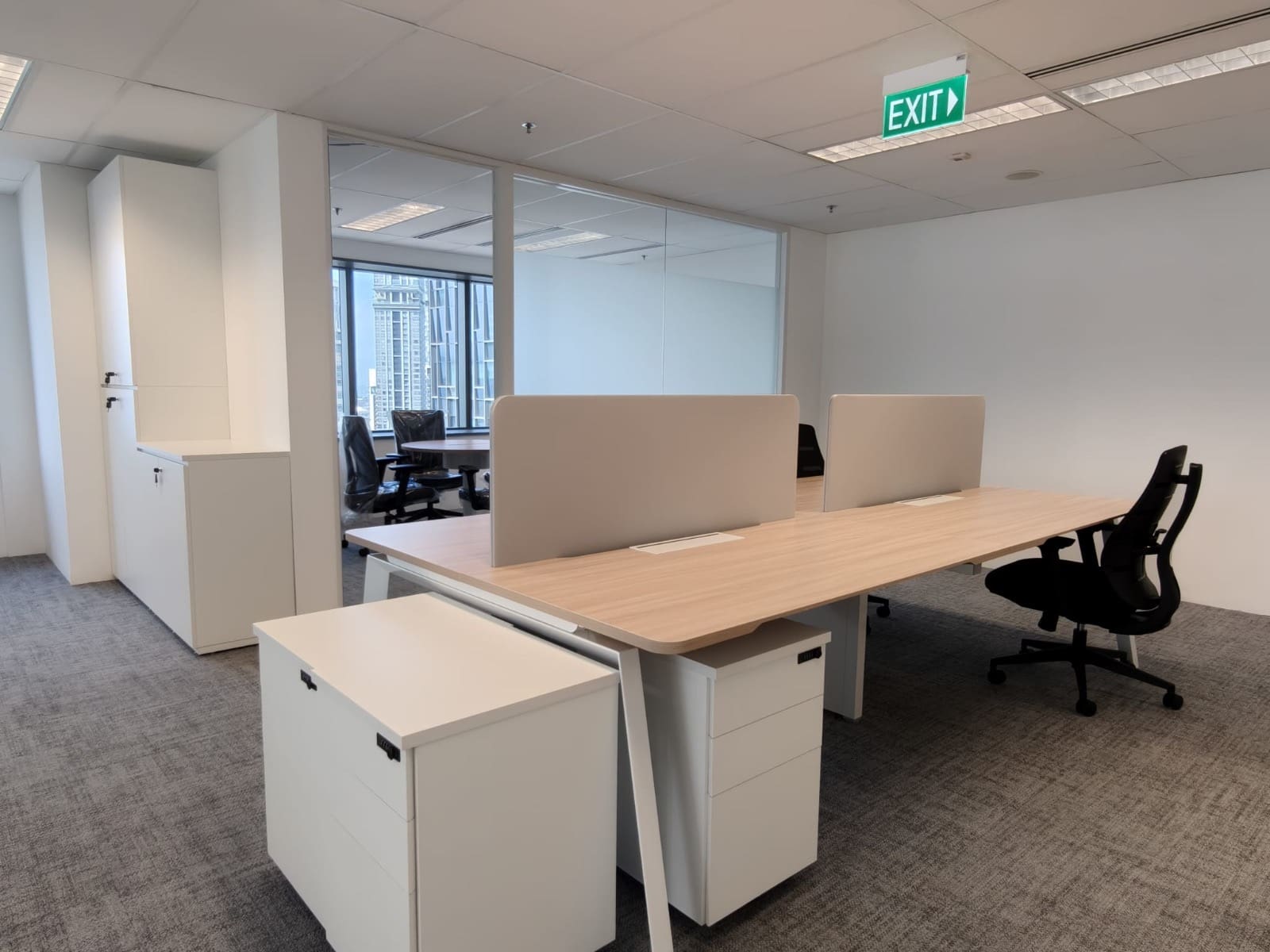 Pair of oak-top desks with fabric screens and white pedestals, OUE Downtown 1, office by Metadesign Interior