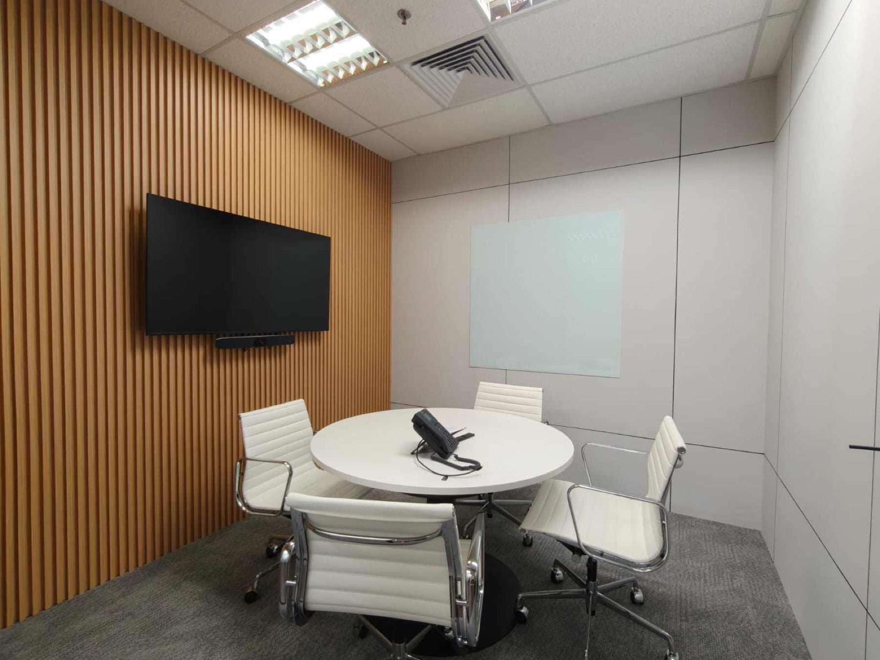 Small meeting room with a timber slat acoustic wall, 78 Shenton Way