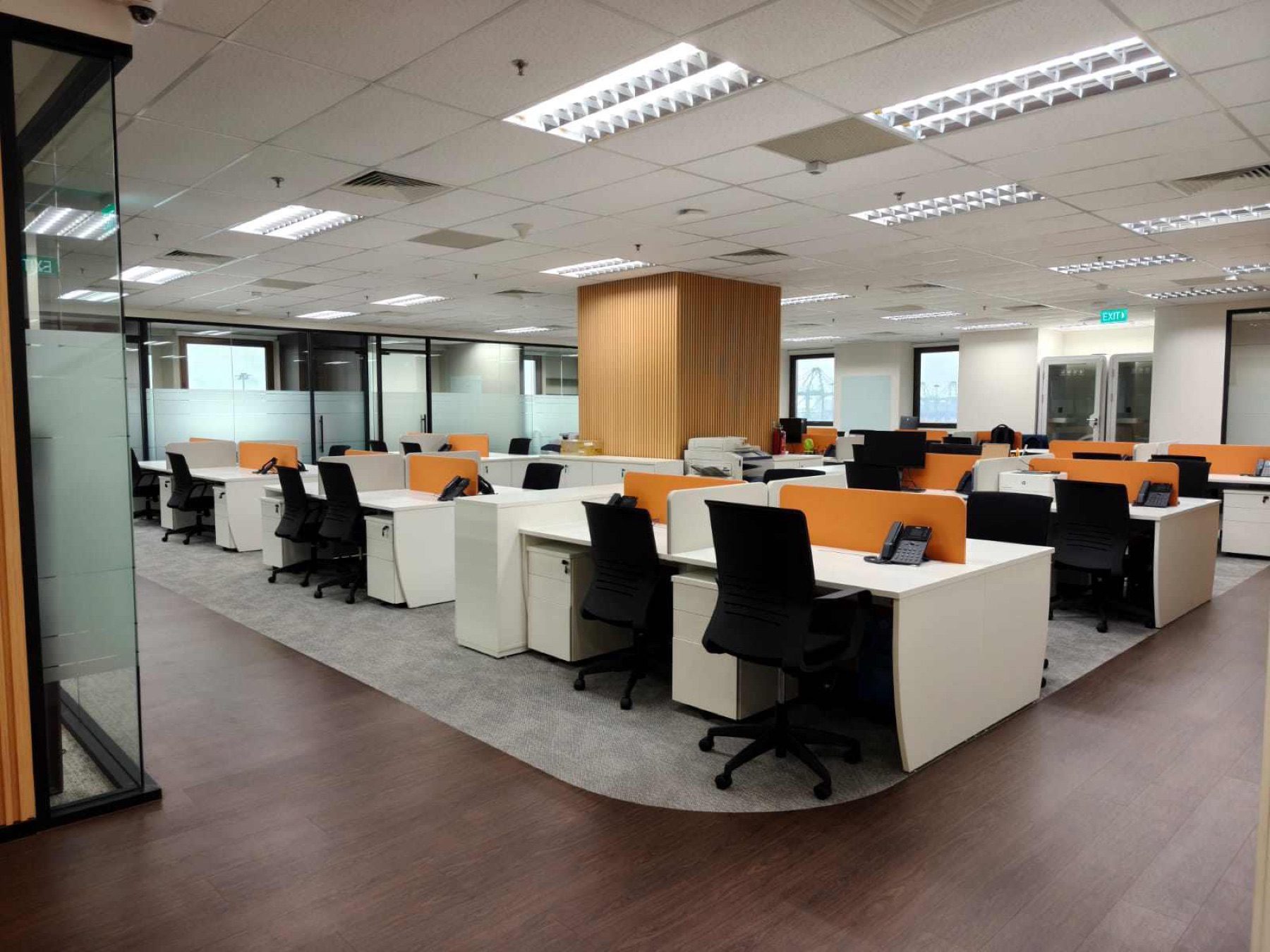 Open-plan office with white workstations and grey carpet zones, 78 Shenton Way
