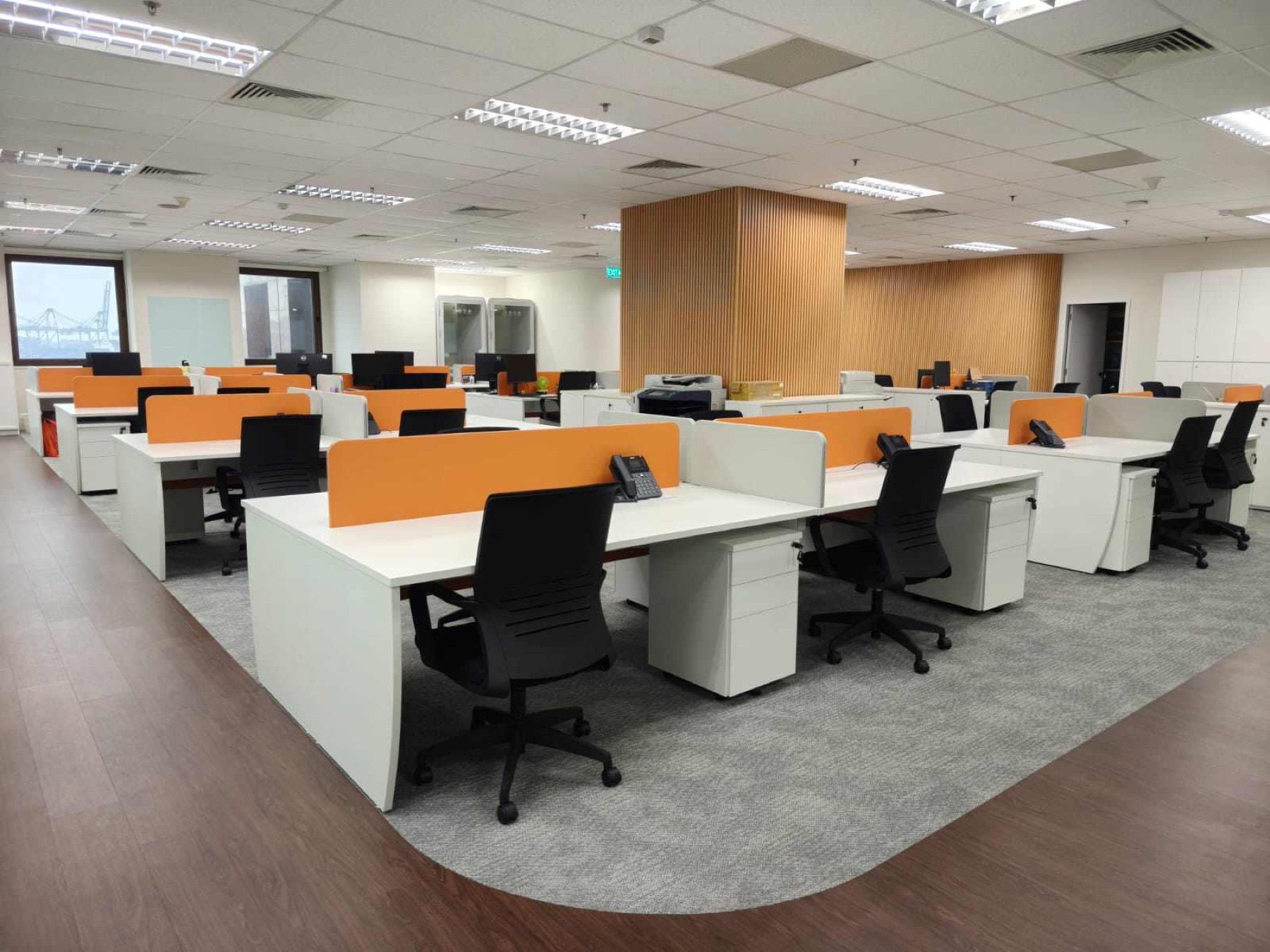 Open-plan workstations with timber-clad columns, 78 Shenton Way
